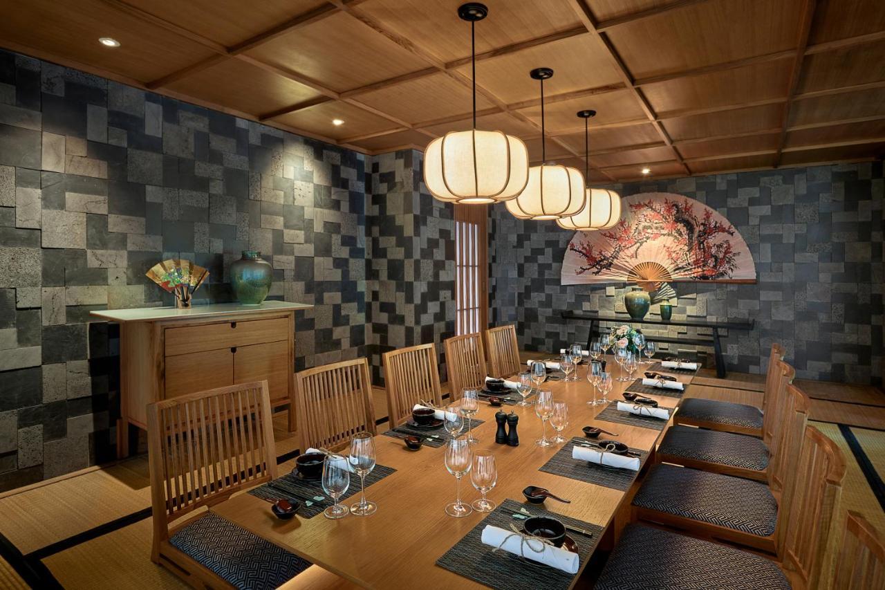 โรงแรมแปร์ล โดริย็อง กัตบา - เอ็มแกลเลอรี Chan Chau ภายนอก รูปภาพ The interior of a restaurant