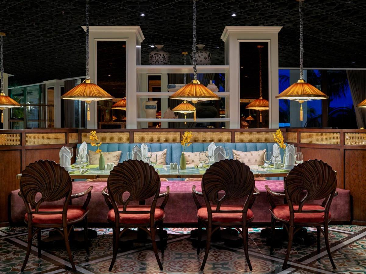 โรงแรมแปร์ล โดริย็อง กัตบา - เอ็มแกลเลอรี Chan Chau ภายนอก รูปภาพ The interior of the restaurant